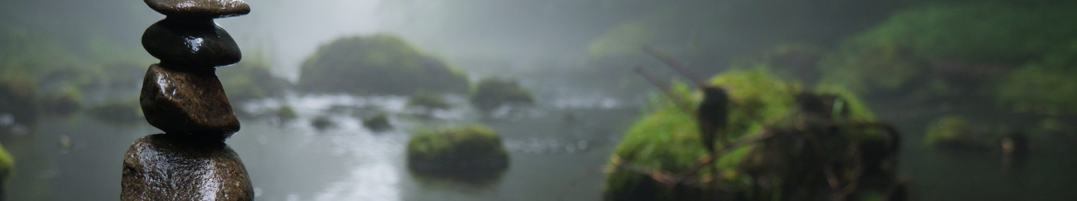 Smooth balanced stones, representing structural balance